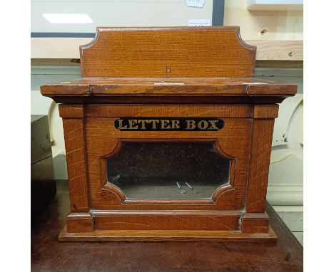 A country house oak letterbox, the front with a 'second class' panel, 30 cm wide