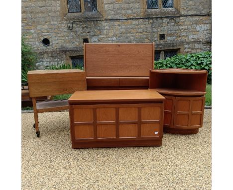 A teak bureau, 92 cm wide, a corner cabinet, 61 cm wide, an oak trolley and a teak unit (4)