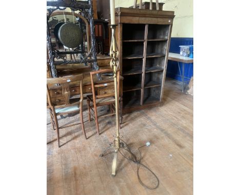 A gilt iron standard lamp