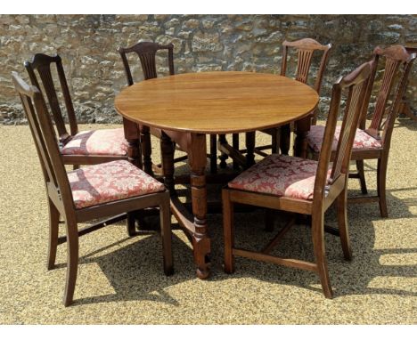 A set of six mahogany dining chairs by James Shoolbred, Tottenham Court Road, London, an oak drop leaf dining table and a mah