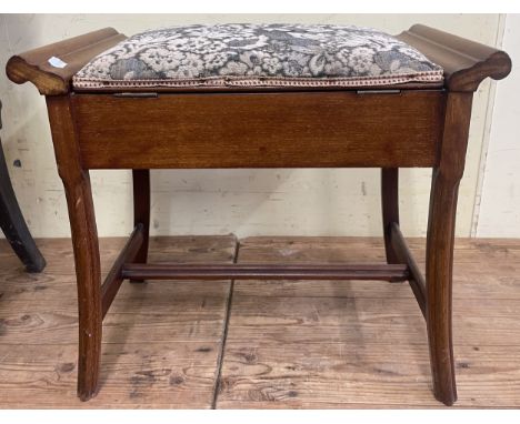 A Continental walnut coffee table, the top 130 cm x 80 cm, a side table, a workbox and a piano stool (4)