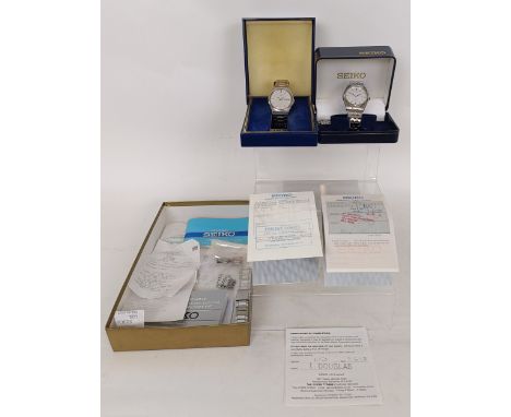 A gentleman's stainless steel Seiko wristwatch, boxed, another, and a Seiko box with paperwork