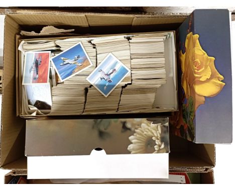 Assorted cigarette cards, stamps and postcards (2 boxes)