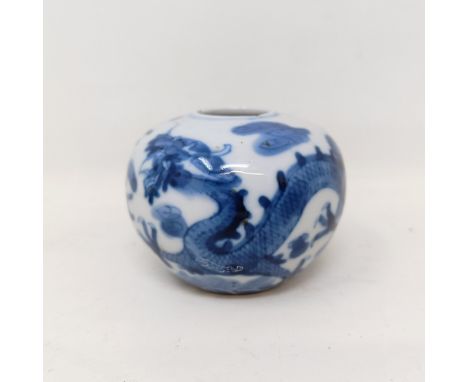 A Chinese Ching dynasty blue and white water pot, 5 cm highsome glazing and firing faults, start of a split to base, no other