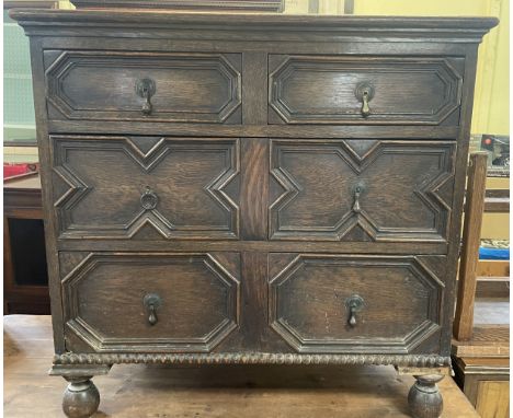 An oak chest, having three drawers, 80 cm wide77 cm high