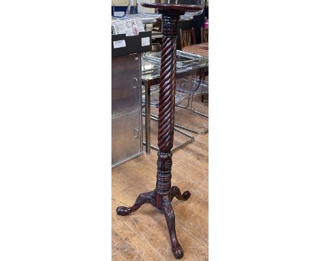 A mahogany torchere, 135 cm high, and a nursing chair (2)