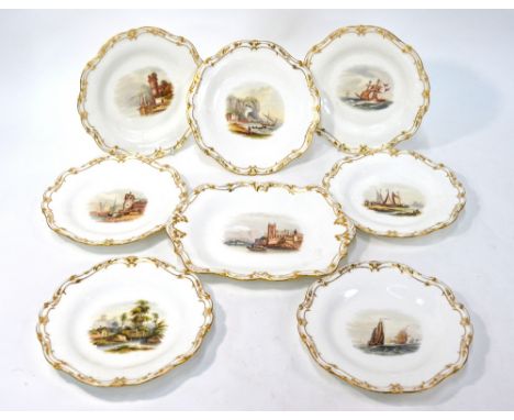 An English 19th century porcelain dessert service having moulded gilded borders and centres handpainted with English and cont
