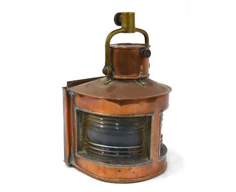 A copper ship's bow-light with port and starboard lens and original spirit lamp, stamped 'Playmit 1943', 35 cm, including swi