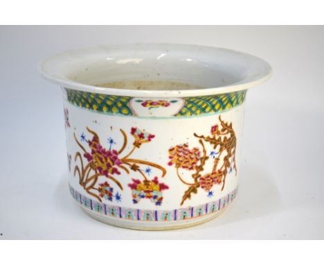 A Chinese famille rose planter, decorated with floral designs and designed with a hole at the base, 23.5cm diameter, post Qin