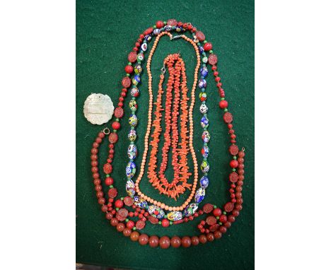 A collection of vintage bead necklaces including two rows of antique stick coral, row of antique graduated coral beads, multi