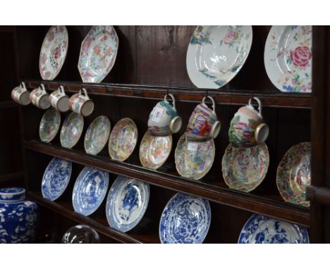 A quantity of Canton famille rose porcelain, comprising: a bowl, 19.5cm diameter; three cylindrical coffee cups; three tea cu