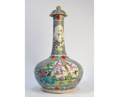 A Chinese famille rose bottle vase and domed cover with knop finial; decorated with panels depicting birds, flowers and garde