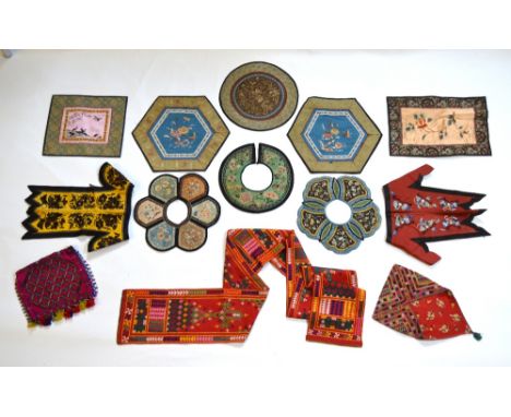 A quantity of Asian textiles, comprising: five Chinese collars; five other small Chinese textiles; a cerise/pink ground bag w