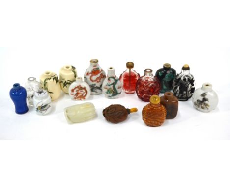 Fifteen Chinese snuff, or other, bottles, including: a green jade bottle designed as a finger citron; a powder-blue monochrom