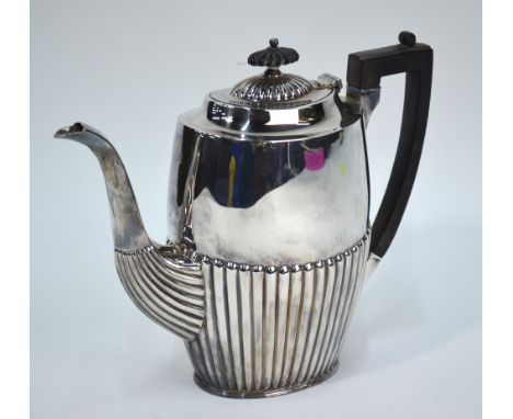 A late Victorian heavy quality silver oval half-reeded coffee pot with ebony finial and handle, W W Harrison & Co, Sheffield 