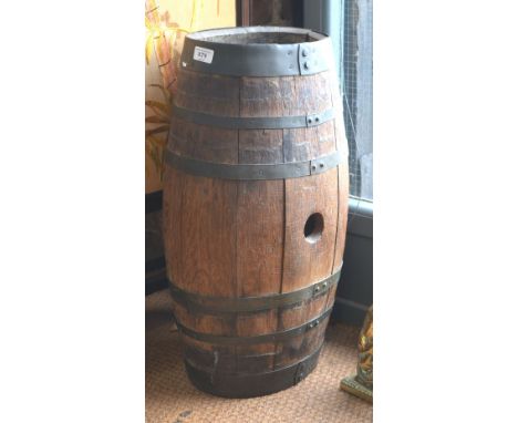 An old coopered barrel stick stand to/w a weighted cast brass door stop in the form of a seated hound (2)