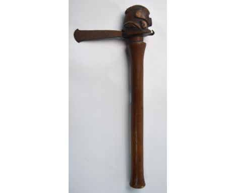 A hardwood Luba tribal axe, Democratic Republic of The Congo, carved with a male head with shaped hair, steel pin eye studs a