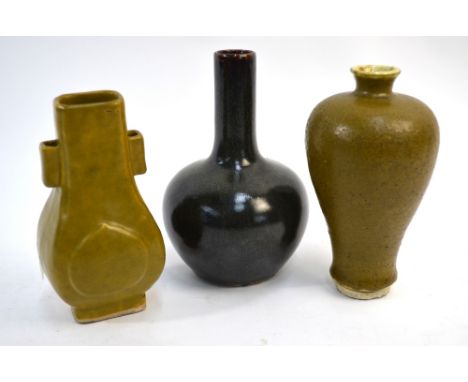 Three small teadust/Ch'a yeh mo style monochromes of various hue, comprising: a meiping, 15cm high; a bottle vase with cylind