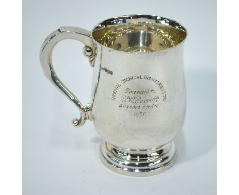 A silver baluster pint mug with scroll handle and raised moulded foot, James Dixon & Sons, Sheffield 1970, 12.3 oz