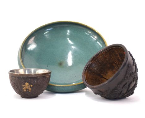 A green circular dish or brushwasher with unglazed foot and base, decorated with a green/blue glaze in the Junyao style, 15.5