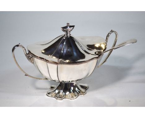 A 19th century Adam revival plated on copper soup tureen and cover, with urn finial and twin handles, on stemmed lobed foot, 