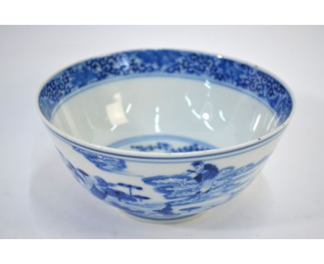 A Chinese blue and white bowl, decorated on the exterior with three figures in a lotus pond, 15cm diameter, the base with fou