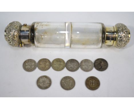 A Victorian plain cylindrical glass double-ended scent bottle with cased silver bun covers, George Brace, London 1886, 14.5 c