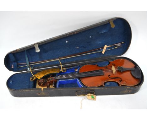 A late 19th century German violin with 'Stradivarius' inner label, two piece flame mahogany back, l.o.b. 36 cm to/w an unname