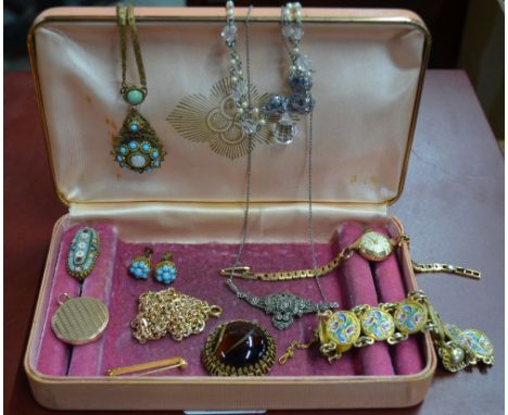 A collection of vintage jewellery items including circular engine turned locket stamped 10ct, 9ct Valex wristwatch on 9ct bra