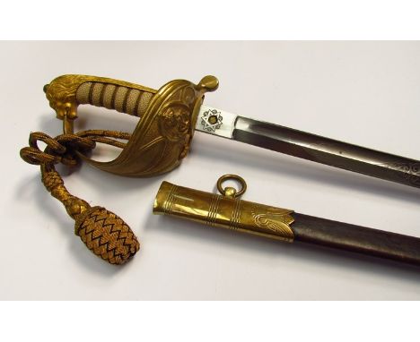 A British 1827 pattern Naval officer's sword with gilt brass hilt set with lion pommel and bearing King's Crown, rayskin grip