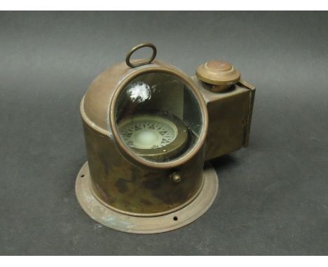 A Royal Navy brass binnacle compass with oil lamp and wick 