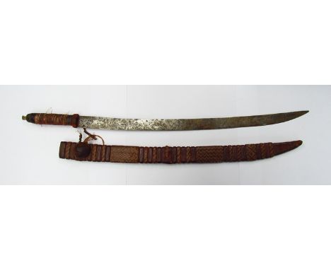 An African sword with hand-forged blade, cane and leather scabbard 