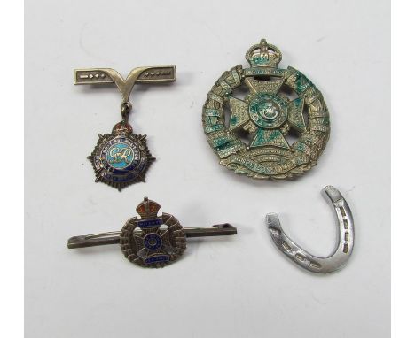 A Rifle Brigade Waterloo cap badge, bar brooch and Royal Army Service Corps bar brooch and horseshoe 