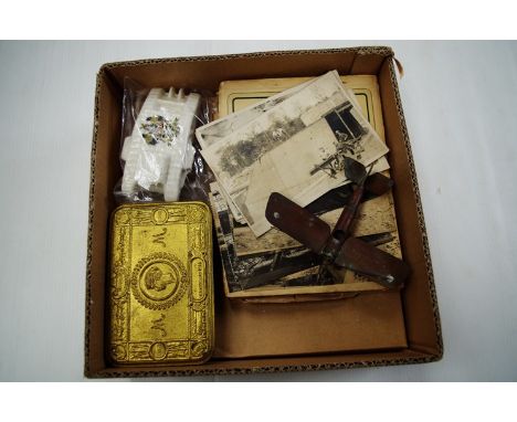 A WWI trench art model of a German aircraft, made out of a bullet, together with a selection of WWI related items including 1