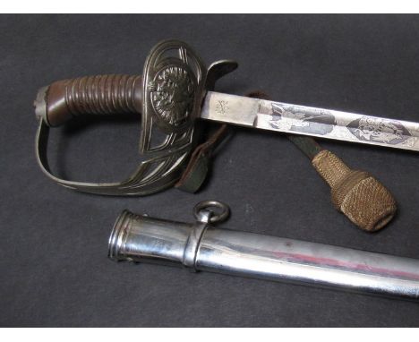 An Imperial German Army NCO 10th Hussar's sabre by Karl Kaiser & Co (CK & Co.) with Bakelite ribbed grip, folding basket guar