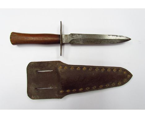 A WWI French trench dagger bearing letters S.G.C.O. to hilt, with associated scabbard    