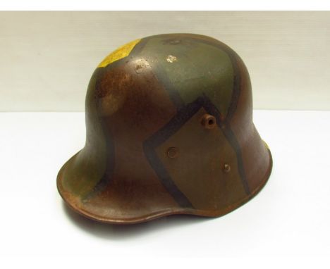 A WWI German style camouflage design helmet with lining