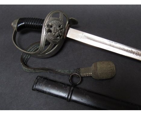 An Imperial German Army 2nd Guard Dragoon officers sword by W. Rohde, Berlin, with Bakelite ribbed grip, eagle crested pierce