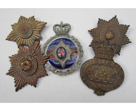 Five badges including Victorian helmet badge and enamelled car badge (a/f)