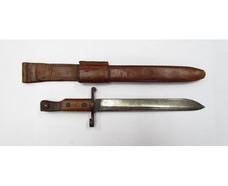 A Canadian Ross bayonet model 1907, with leather scabbard marked MKI 1915