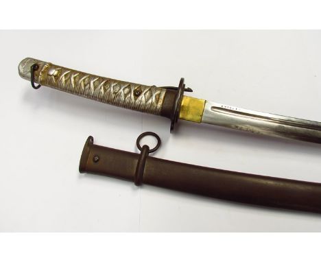 A Japanese NCO's sword (Gunto) circa 1935-45 with iron guard (tsuka), alloy handle (tsuka) and blade with single fuller (hi),