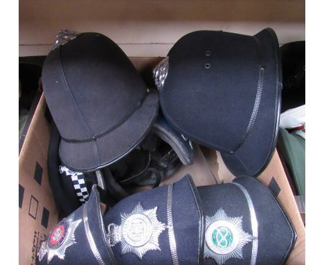 A police riot control helmet together with five Bobby hats and a peaked cap (7) 