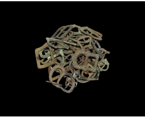 14th-19th century AD. A mixed group of mainly bronze buckles including double-loop and twin-tongue types, shoe-buckles and ot