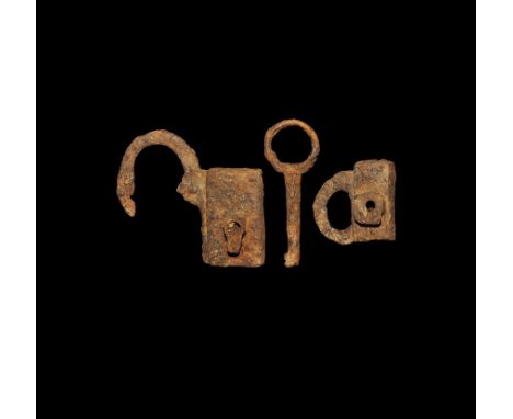 13th-15th century AD. A mixed group comprising: two iron locks with raised key-guides to one face; key with looped bow, round