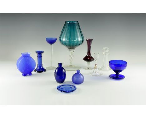 20th century AD. A group of glass items comprising: a pair of cobalt glass small bottles or bud vases; a cobalt glass stemmed