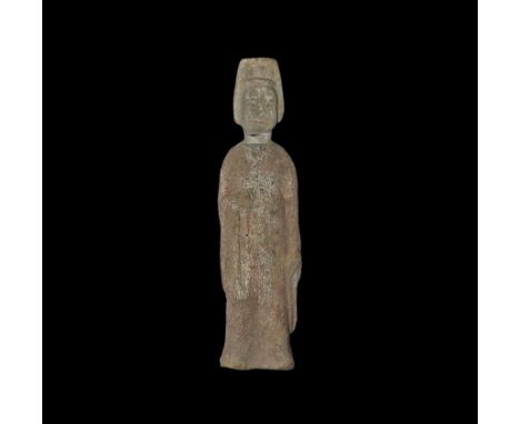 Northern Qi Dynasty, 550-577 AD. A hollow-formed ceramic figurine of a robed lady in formal headdress, gown with bell-sleeves