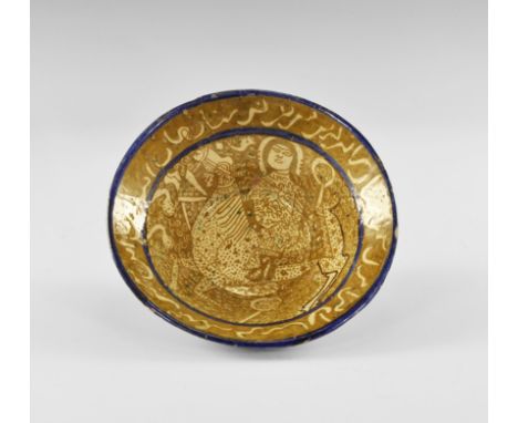 20th century AD. A creamware ceramic bowl with basal ring, glazed inner dace with image of a horseman within a band of callig