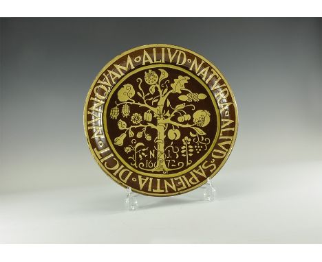19th century AD or later. A ceramic stoneware charger with ochre-coloured overglaze depicting the Tree of Knowledge with init