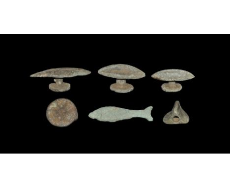 1st-2nd century AD. A mixed group of bronze fittings comprising: three scaphoid studs with linear hatching; a discoid slider 