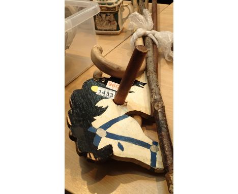 Four various sized walking sticks and a hand carved hiking stick with personal inscriptions. Not available for in-house P&amp